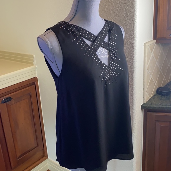 BCBGMaxAzria Tops - BCBG BLACK SILVER STUDDED TOP. PEEK A BOO FRONT
